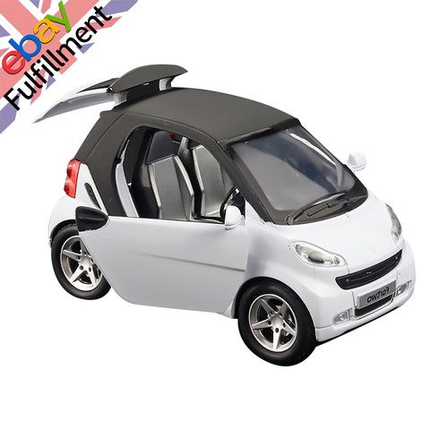 White pull back model car - white,