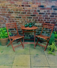 Wooden garden and patio set. Table and two chairs. Balcony table and chairs.