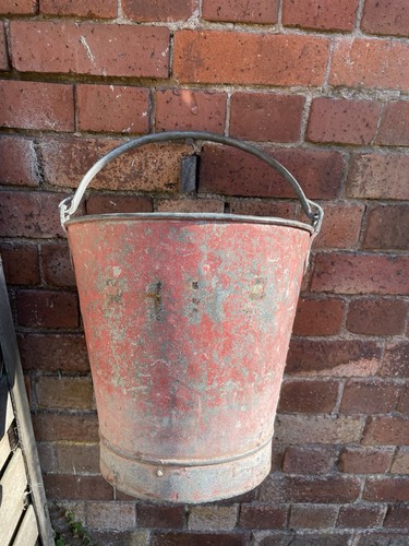 Vintage red riveted metal fire - metal,