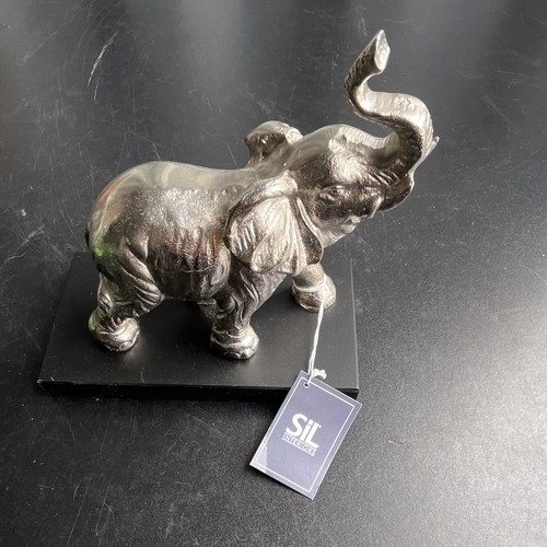 Silver looking elephant - silver,