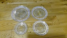 set of 4 decorative glass pressed plates approx 10", 9", 7" &6" occasion/parties