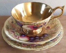 Vintage Aynsley Orchard Gold cup and saucer signed N. Brunt.