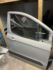 FORD TRANSIT COURIER OFFSIDE