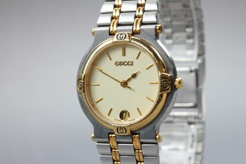 Near mint gucci 9000m gold - gucci,