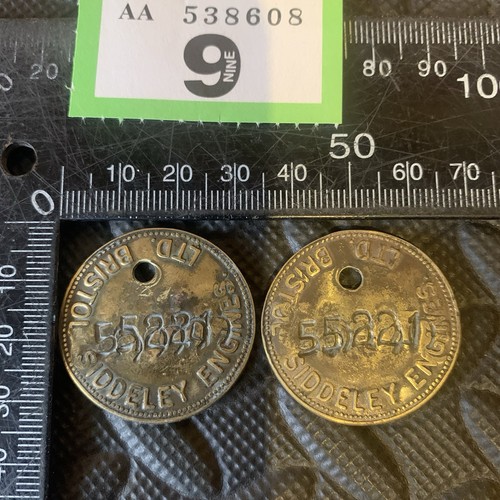 Rare brass token - 2x,