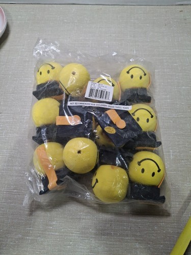 Yellow foam smiley face - smiley,