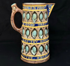 MAJOLICA MOTTO HANDLED JUG BY