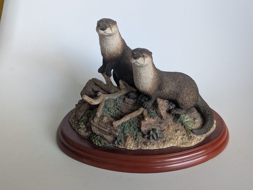 Border fine arts otters - arts,