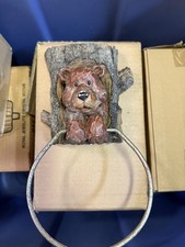 Rustic Bear in Tree Trunk