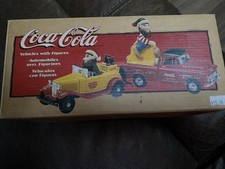 Coca Cola 1932 Chevy Roadster, 57 Chevy Pickup and 2 elf figurines new in box 