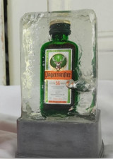 A Unique Jagermeister  miniature bottle of Jägermeister set in resin