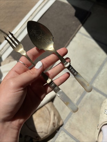 Mother pearl handled spoon - of,