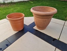 2 PLASTIC TERRACOTTA PLANT POTS / PLANTERS. 1 LARGE BELL POT, IDEL MEDIUM