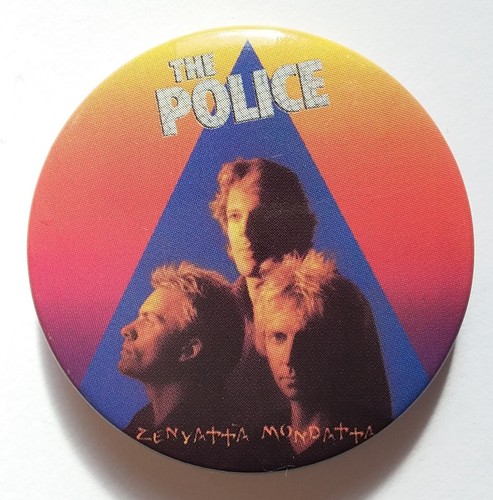 The police large button badge - the,