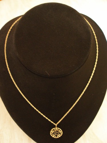 Carat gold disc - 18,
