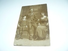Real Photo Postcard showing a Royal Malta Artillery Soldier & his family
