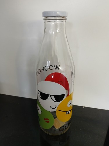 Patterned glass milk bottle - glass,