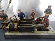 twin mill engine running on steam and air  23X14X9 cms. wt 2.5kg packed.fly 7cms