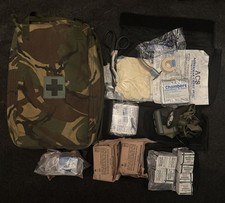 Rare British Army DPM Medical kit Bergen side Pouch with first aid kit bits. 