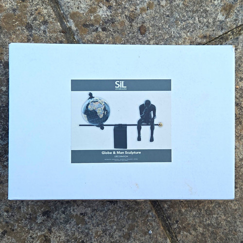 Sil globe man sculpture - &,