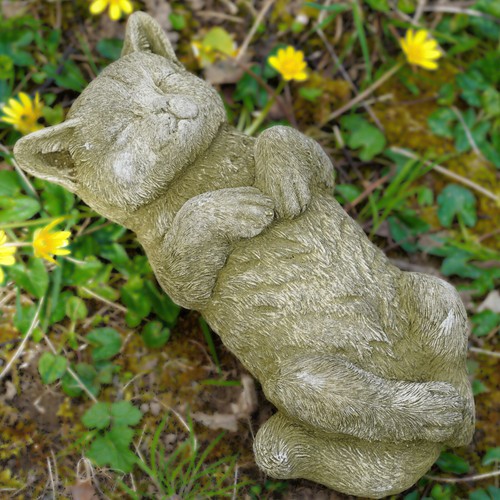 Basking cat stone statue - basking,