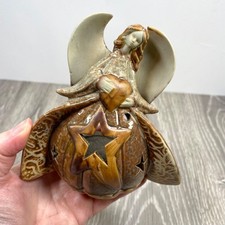 Rustic ‘Angel Holding