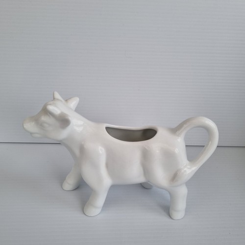 Porcelain white cow - porcelain,