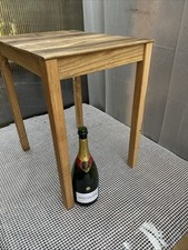 Tall side table made from