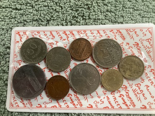 Foreign coins shown - foreign,