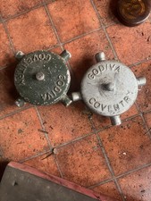 A Pair Of Coventry Climax Blanking Caps