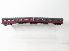 OO gauge Ian Kirk kit built maroon articulated coaches.
