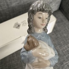 NAO by Lladro Girl Cuddling