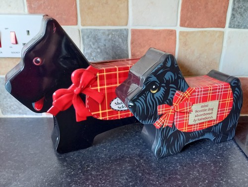Two scottie dog tins - two,