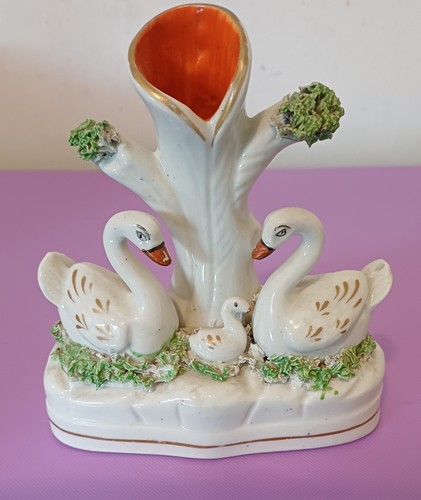 Miniature swans with - miniature, cygnet