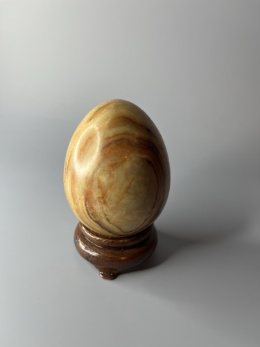 Polished stone egg wooden - stone,