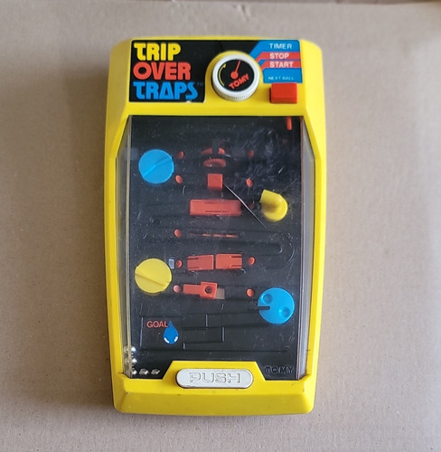 Tomy trip over traps - trip,