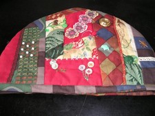Crazy patchwork handmade tea cosy with embellishments lined