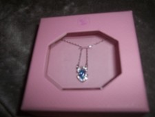 Genuine Swarovski Crystal necklace silver coloured with blue/lilacy stone BNIB