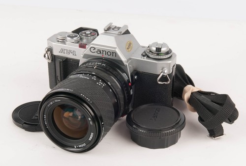 Canon slr 35mm camera - av-1,