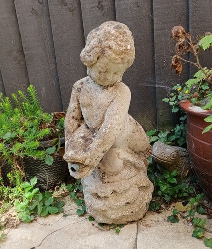 Vintage concrete stone cherub