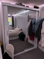 White Mirrored Sliding Door Double Wardrobe with Shelves 216x180x62