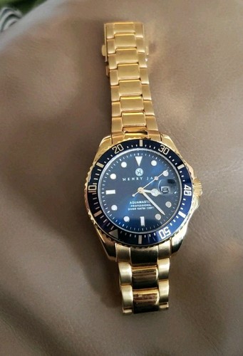 Henry aquamaster 23k gold - j,