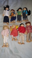 Collection of 8 Wooden Dolls
