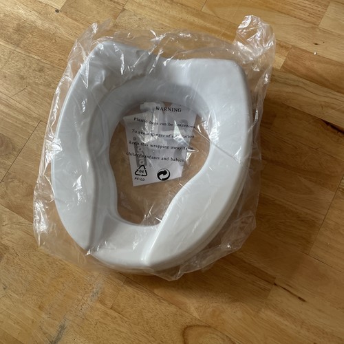 Raised toilet seat with lid - raised,