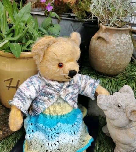 Hand knitted teddy bear