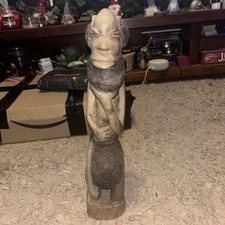 hand-carved wooden tribal