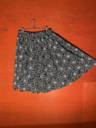 Pinup girl clothing spiderweb