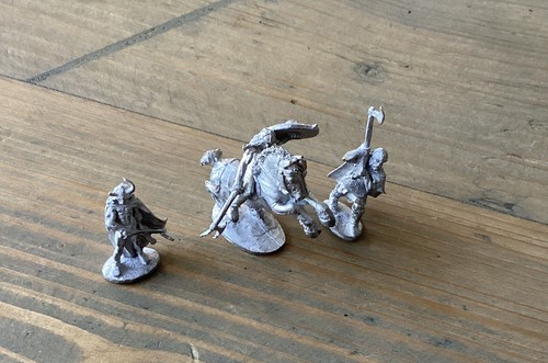 Three ral partha figures one - partha,