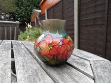MOORCROFT   POTTERY . FLAMBE FREESIA PATTERN VASE