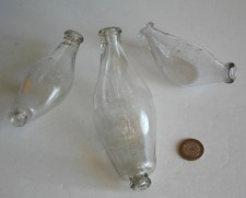 Trio of vintage early C20th glass baby feeders from Boots & Allenburys